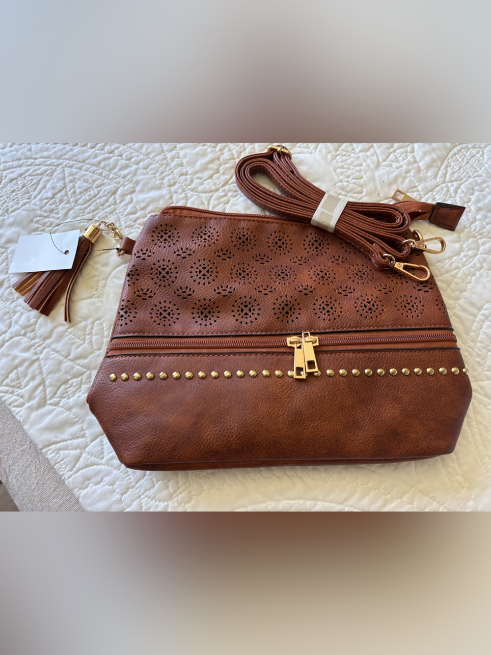 Women's Brown Laser-Cut Crossbody Bag with Tassel